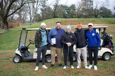Participants kept warm on the greens with our beanies as well