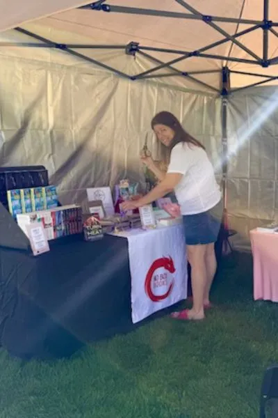 A craft fair where I sold books under my NO BOX BOOKS brand The banner was on point