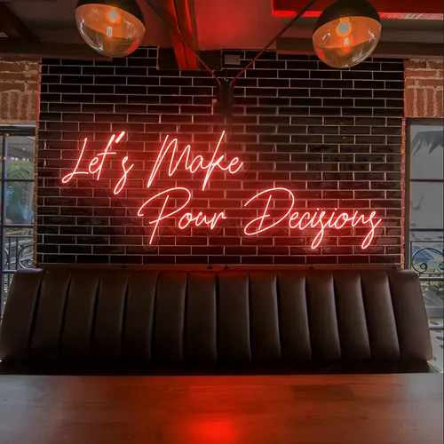 Eye-Catching "Let's Make Pour Decisions" Neon Sign - Custom Phone Wallets Now